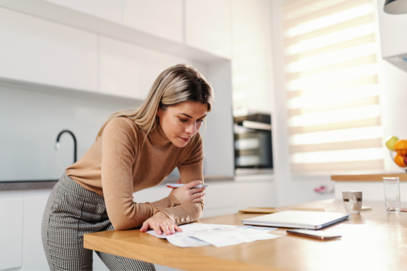 Woman analyzing loan documents